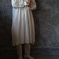 High count no collar bib dress 